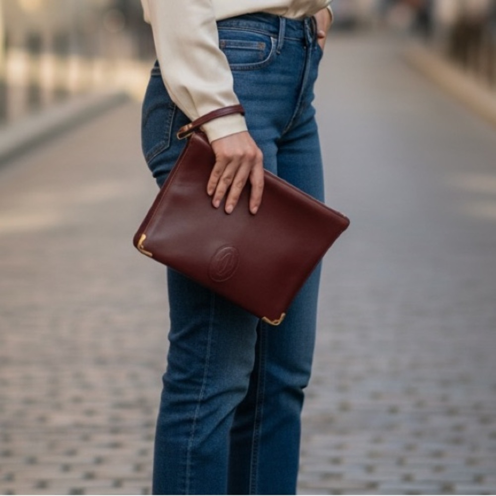 Authentic Cartier Burgundy Leather Clutch with Gold Accents - Picture 3 of 17